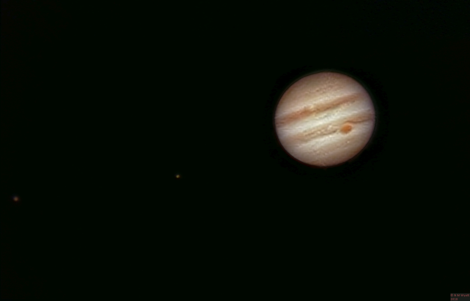 Ganymede, Io and Jupiter with the Great Red Spot