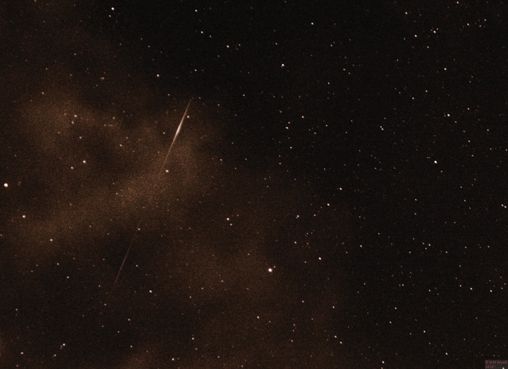 A Perseid meteor seen through light cloud A Perseid meteor seen through light cloud